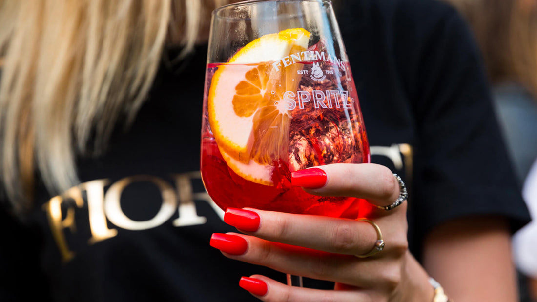 Woman drinking Fentimans cocktail